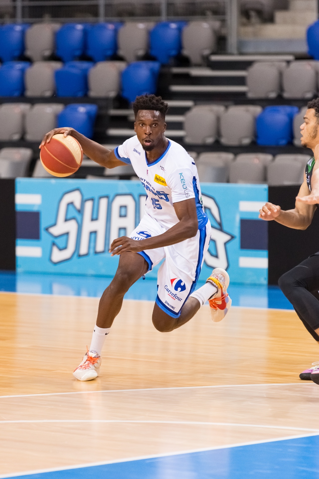 Portrait of Axel Louissaint, professional basketball player and coach